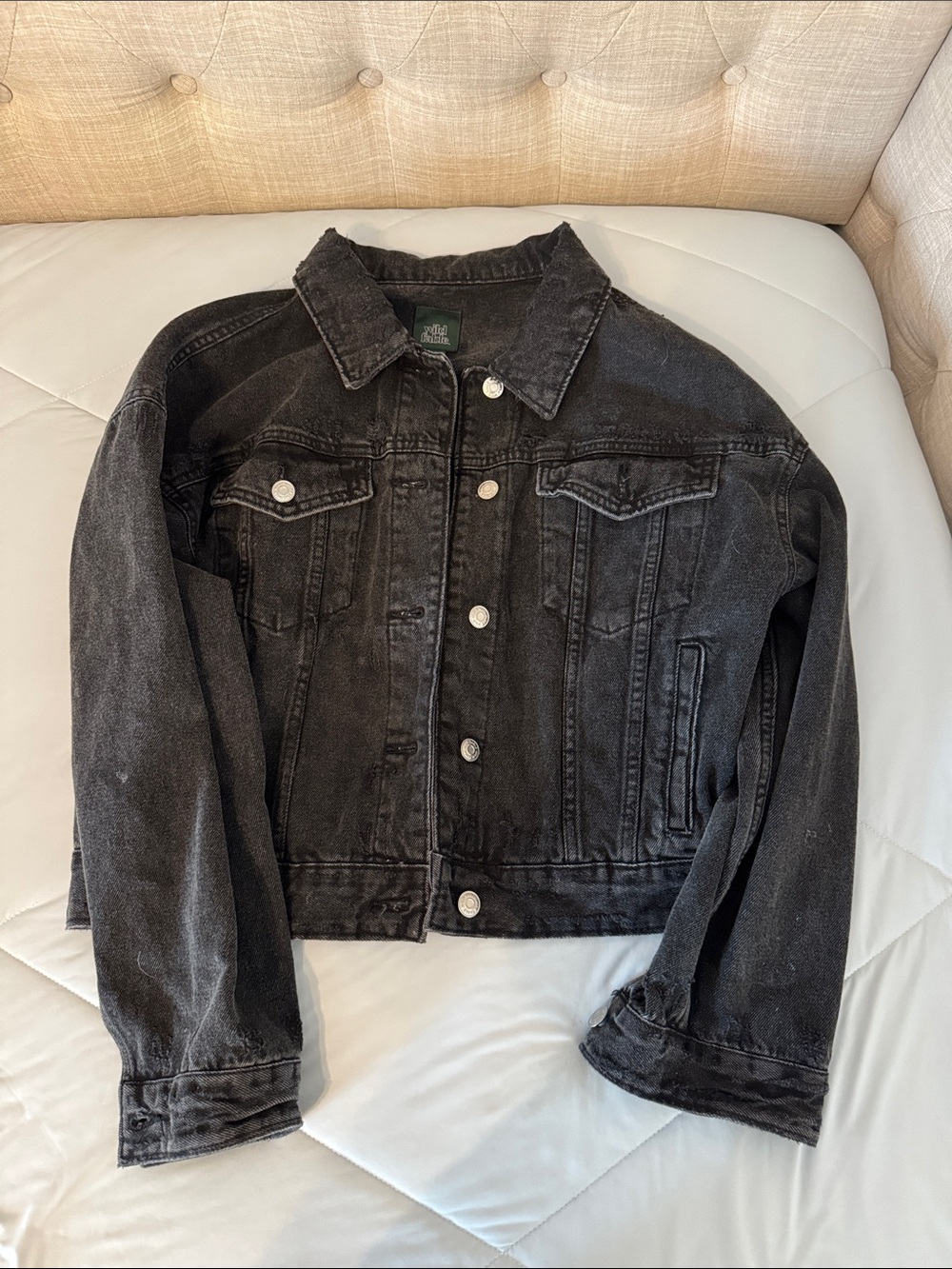 Black distressed denim jacket